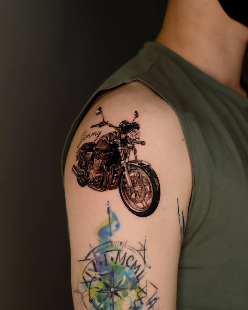 Daddy's Honda tattoo located on the shoulder, micro-realistic style.