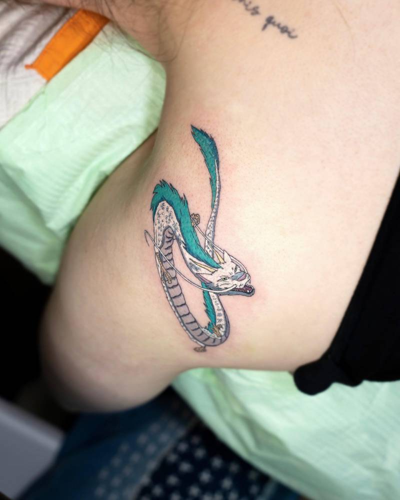 Haku tattoo located on the shoulder blade.