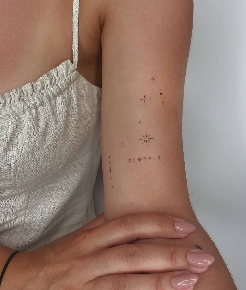 Scorpius constellation tattoo located on the inner arm.