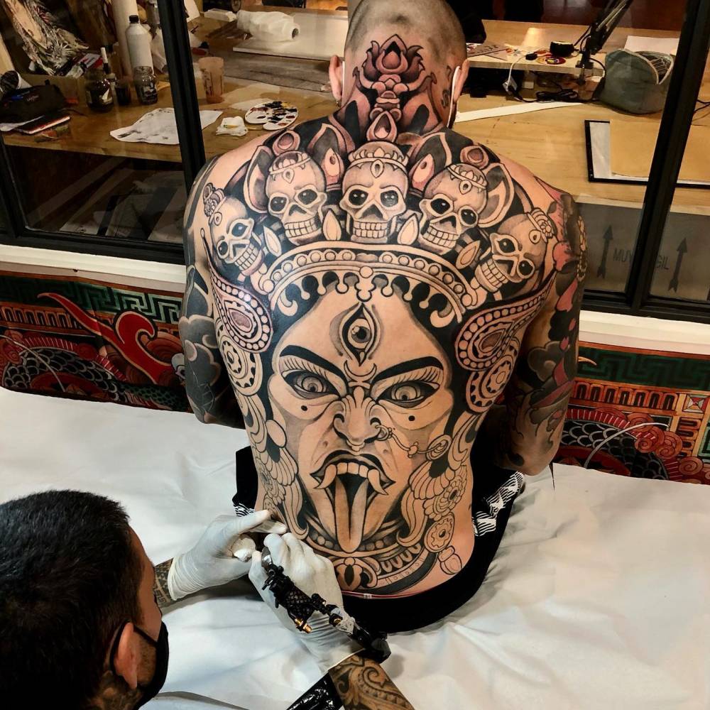 Kali backpiece tattoo.