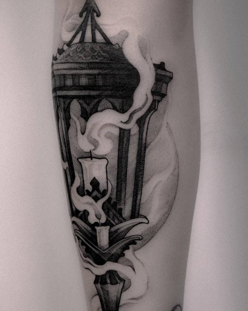 Lantern tattoo done on the inner forearm, neotraditional style.