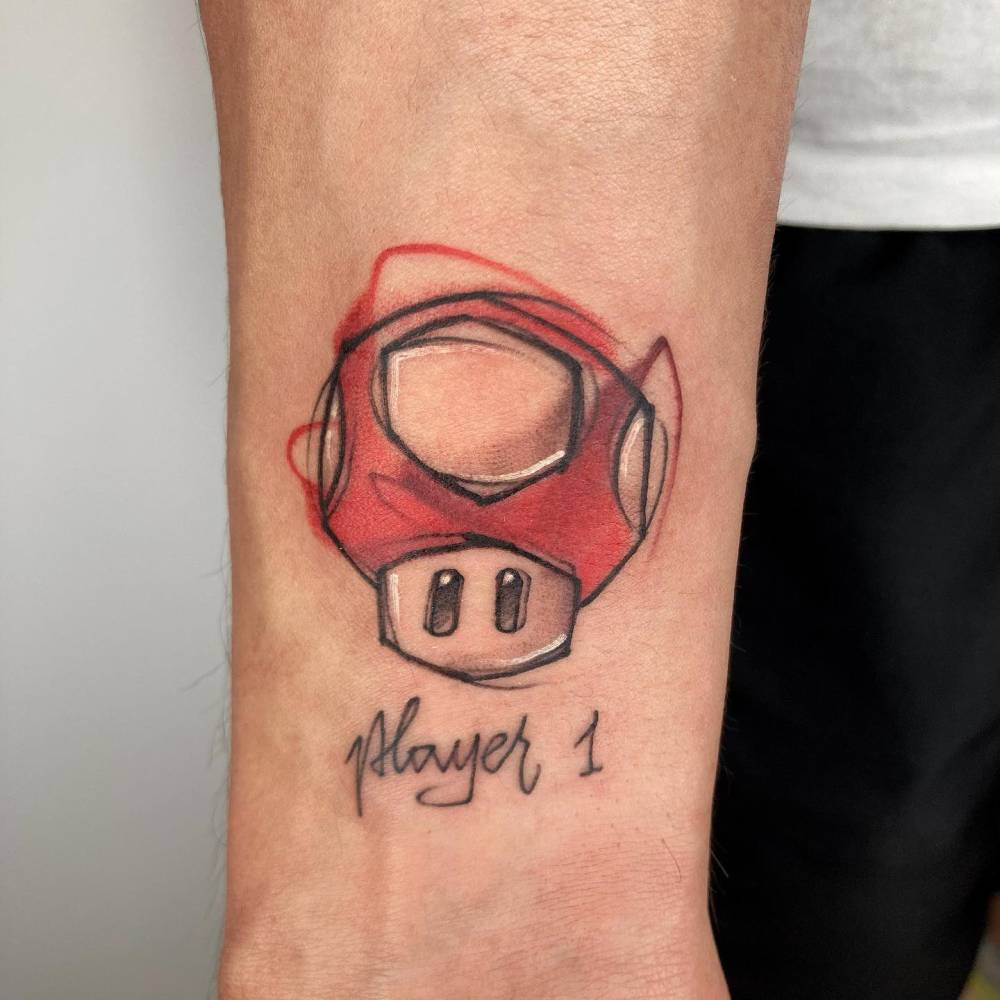 Super Mushroom tattoo done on the wrist, sketch work style.