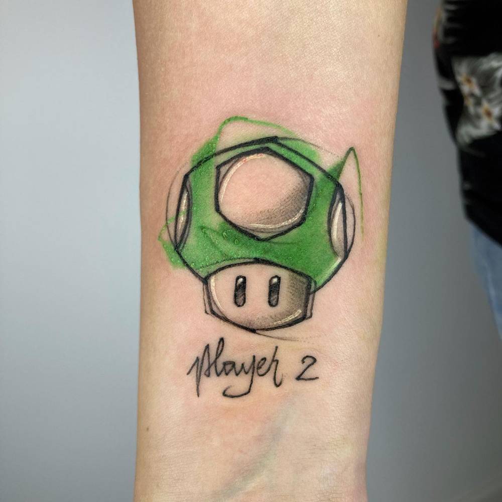 Super Mushroom tattoo done on the wrist, sketch work style.