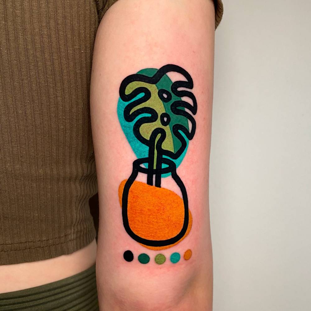 MONSTERA LEAF in a DESTRUTTURATO TERRACOTTA VASE.