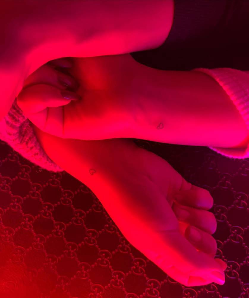 Matching minimalistic hearts tattooed for best friends.