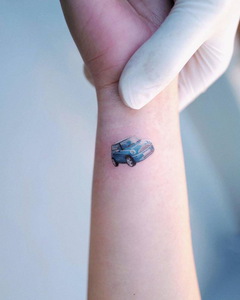 Micro-realistic style MINI tattoo located on the wrist.