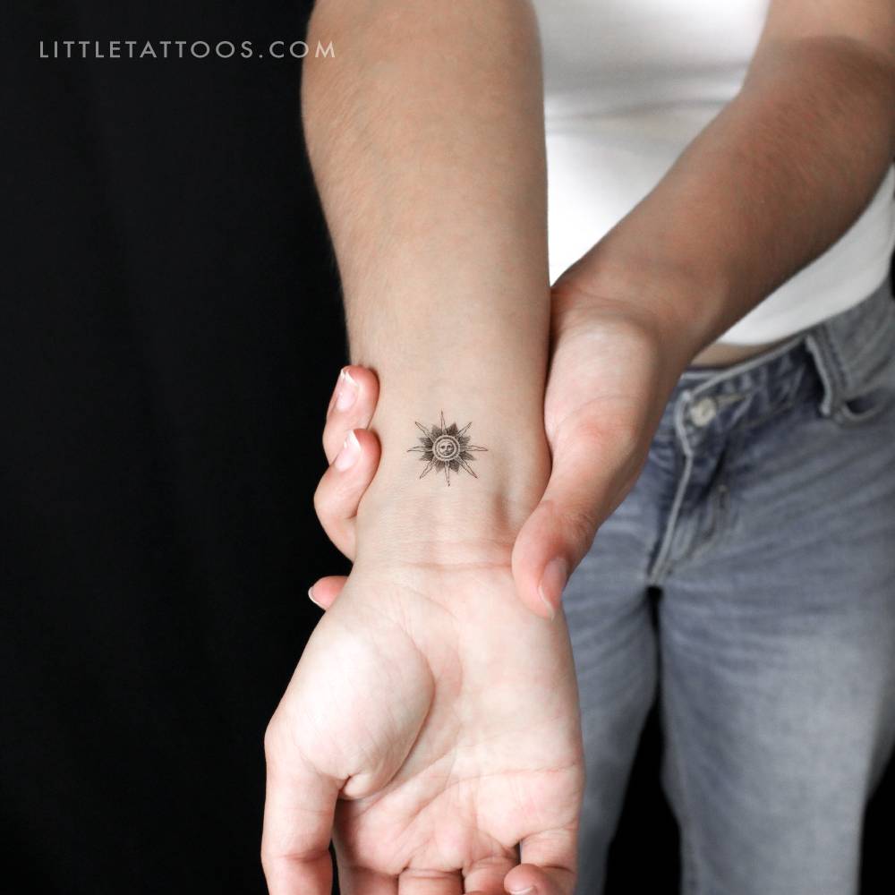 Little Inti temporary tattoo placed on the wrist.