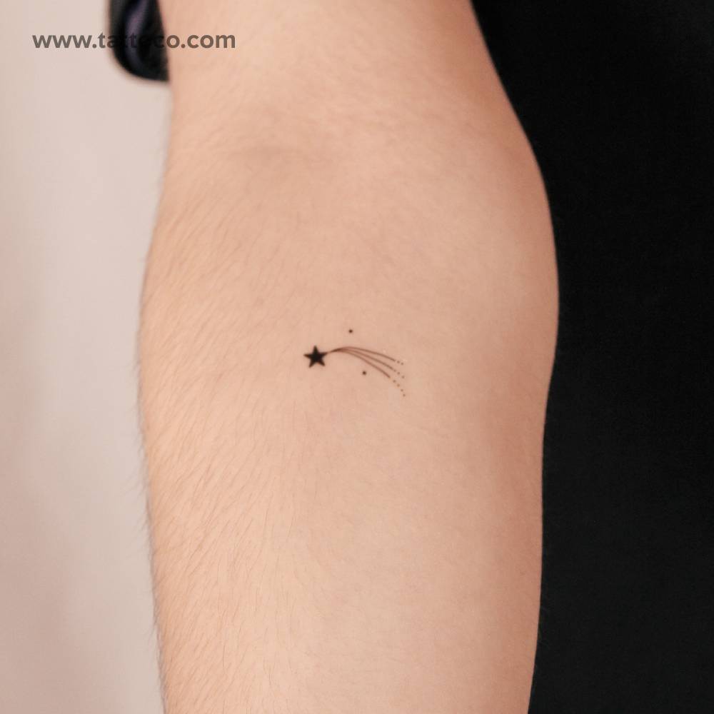 Little shooting star semi-permanent tattoo located on the inner forearm.
