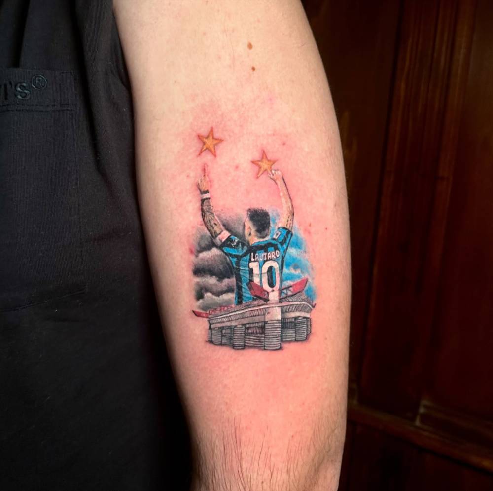 Lautaro Martinez tattoo located on the upper arm, done in micro-realism.