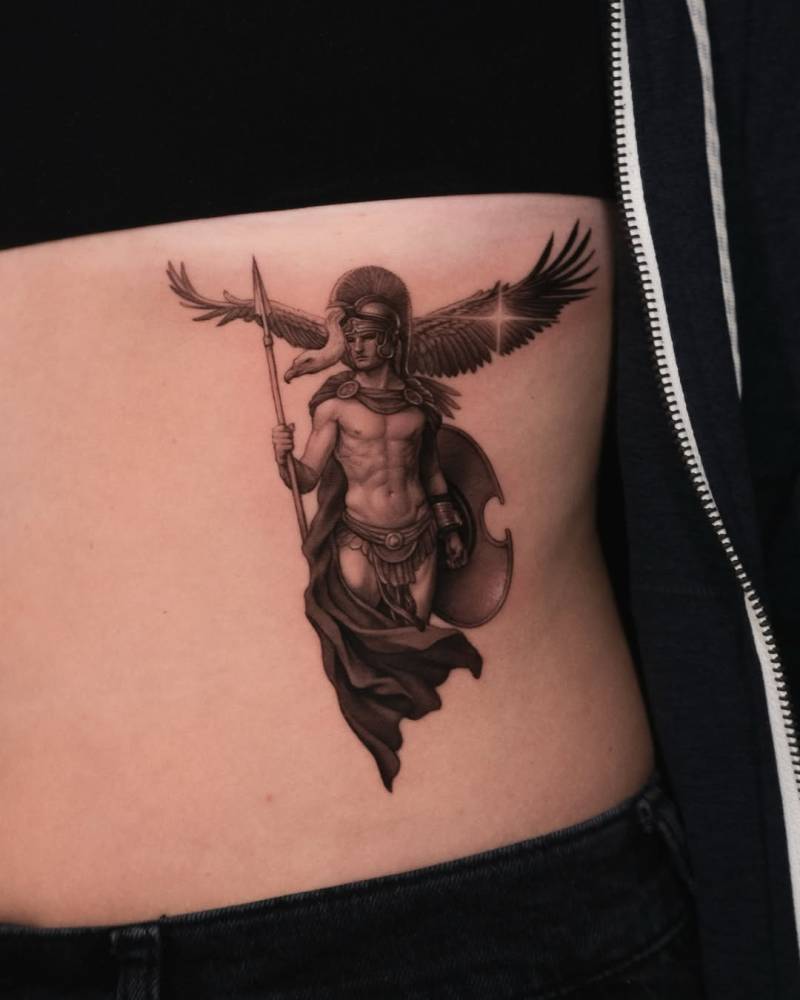 Micro-realistic style Ares tattoo located on the waist.