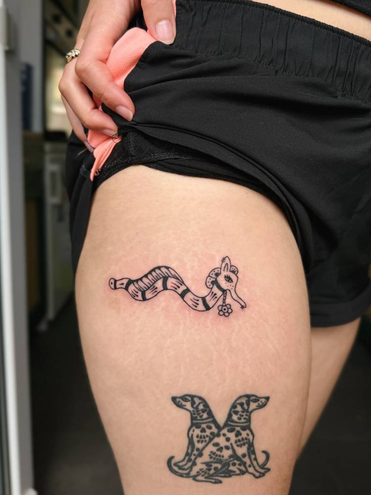 Illustrative style seadragon tattoo located on the thigh.