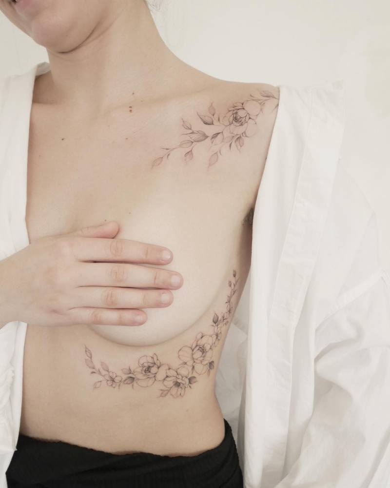 Peonies and cherry blossom tattoos.