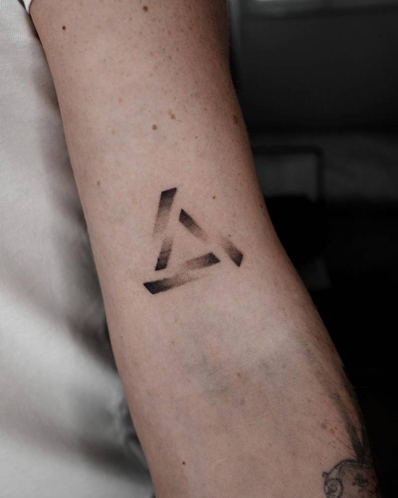 Dotwork Penrose Triangle Tattoo on the Bicep