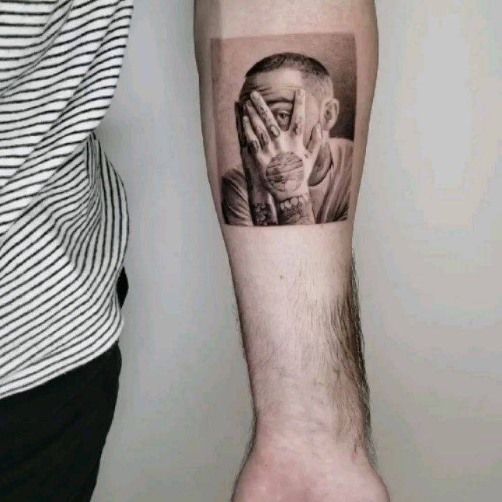 Micro-realist Mac Miller tattoo on inner forearm