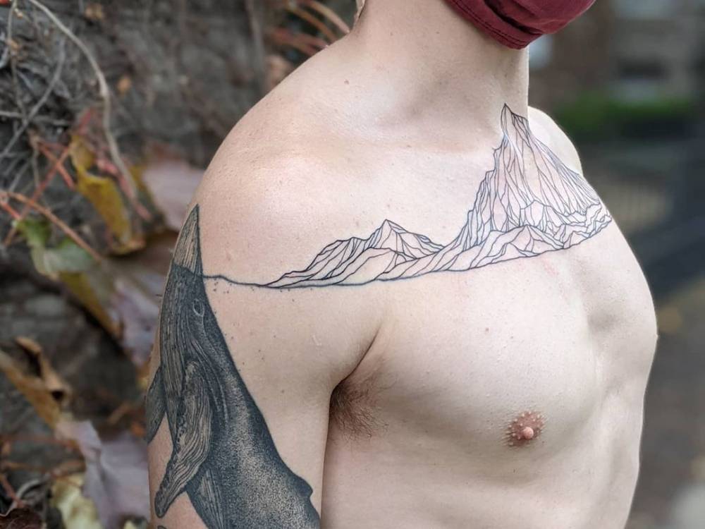 Freehand Antarctica's Mount William tattooed in line art