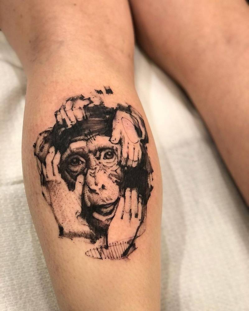 Sketch work chimpanzee tattoo on the calf