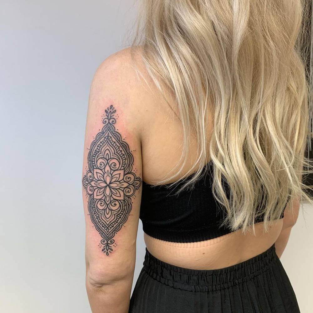 Ornamental tattoo on the tricep.