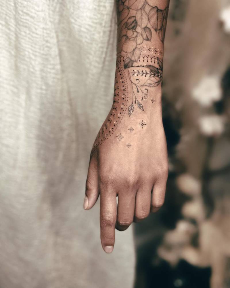 Ornaments tattoo on the wrist.