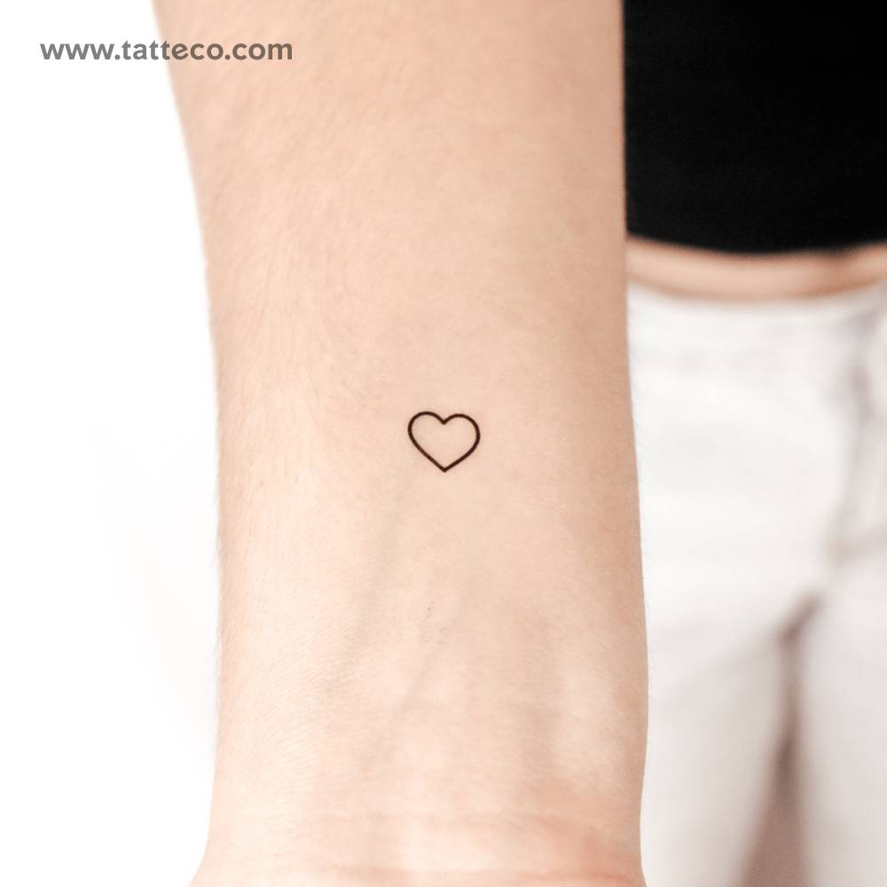 Small minimalist heart outline semi-permanent tattoo.