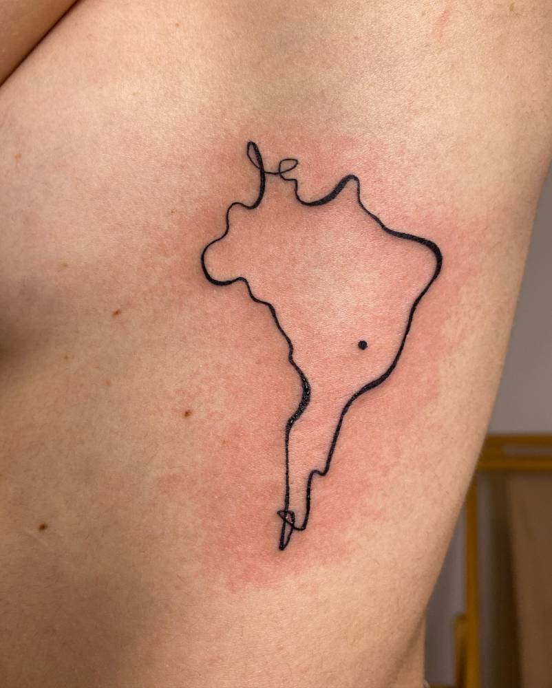 One line Brazil map tattoo located on the side boob.