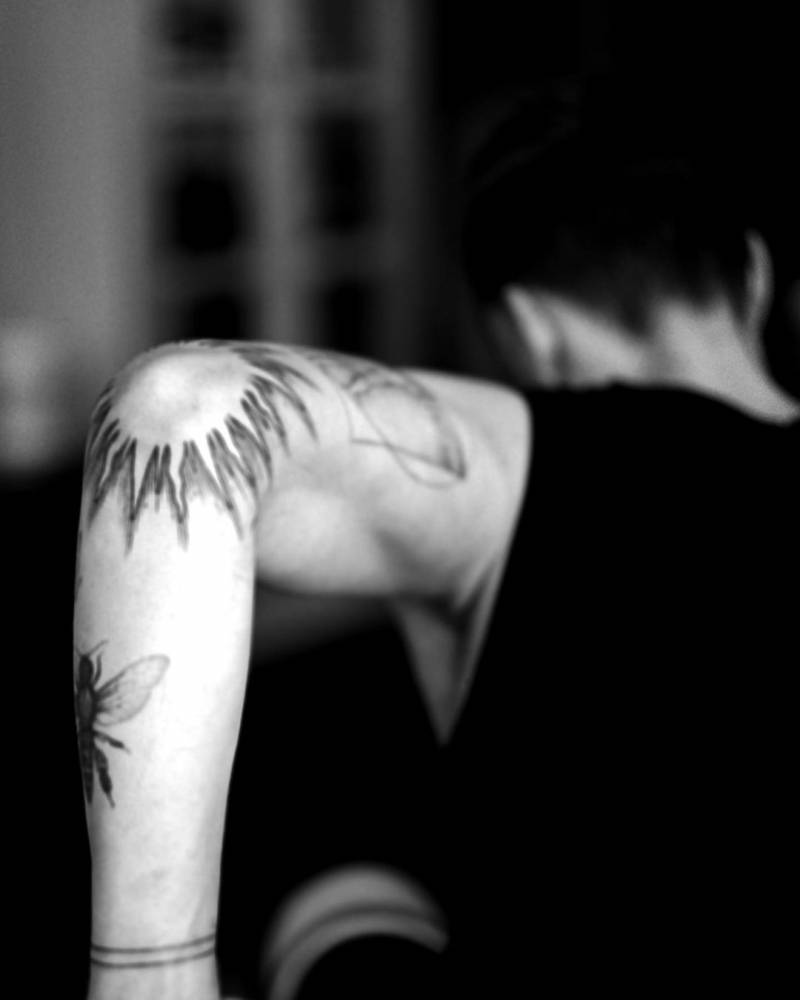 Line Art Sun Tattoo on Elbow