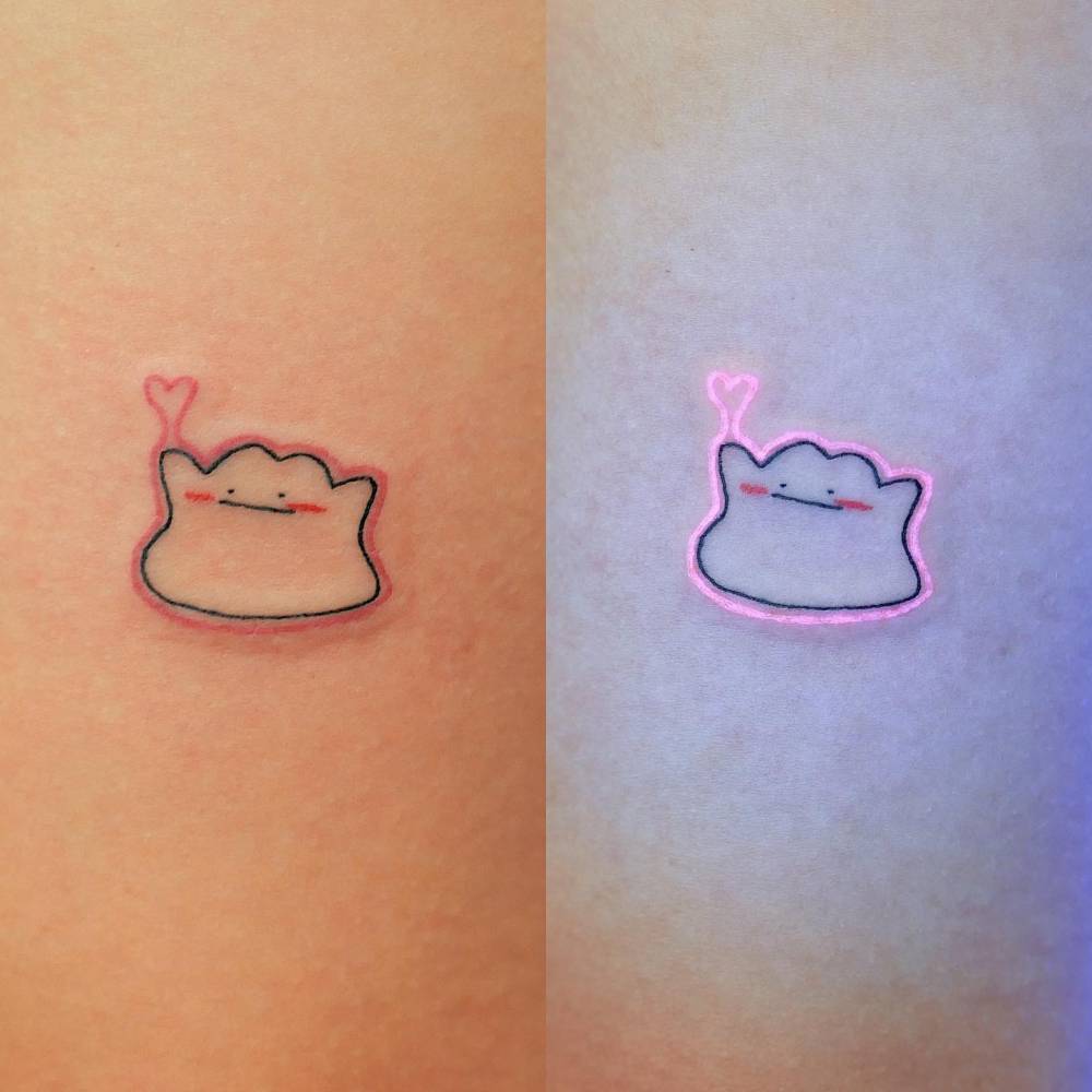 UV ink Ditto tattoo placed on the tricep.