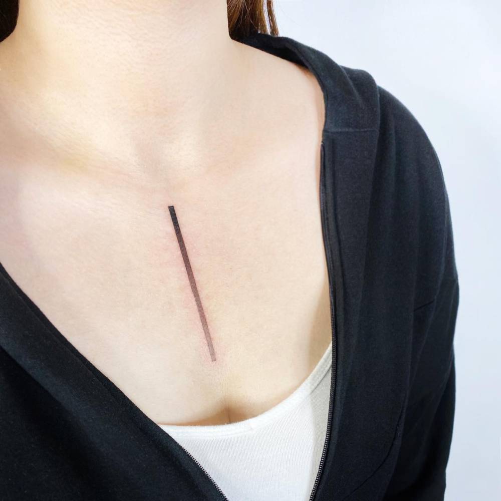 Spectrum line tattoo located on the chest.