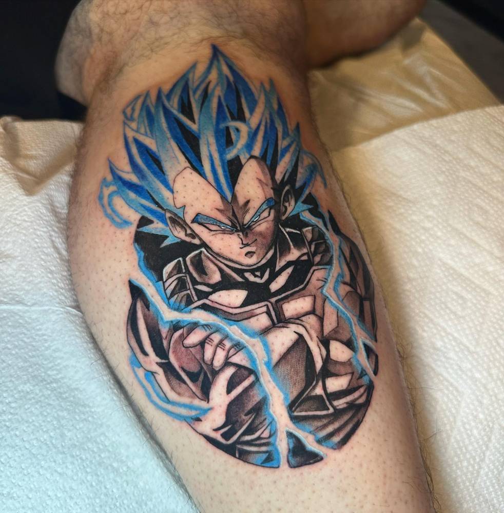 Vegeta portrait tattoo located on the calf, cartoon style.