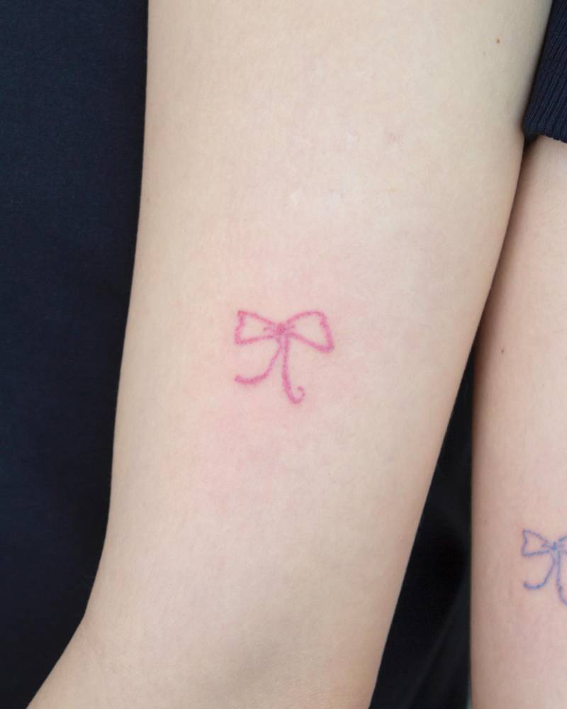 Matching watercolor ribbon tattoo for best friends.