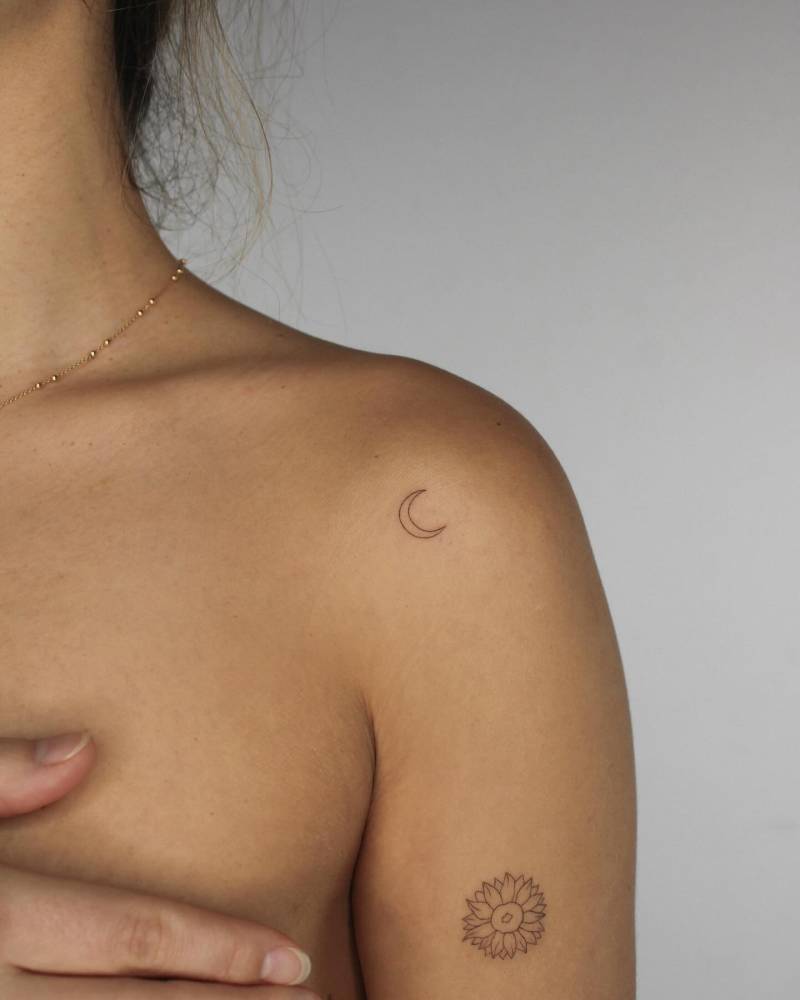 Moon and sunflower tattoos done in fine line style.