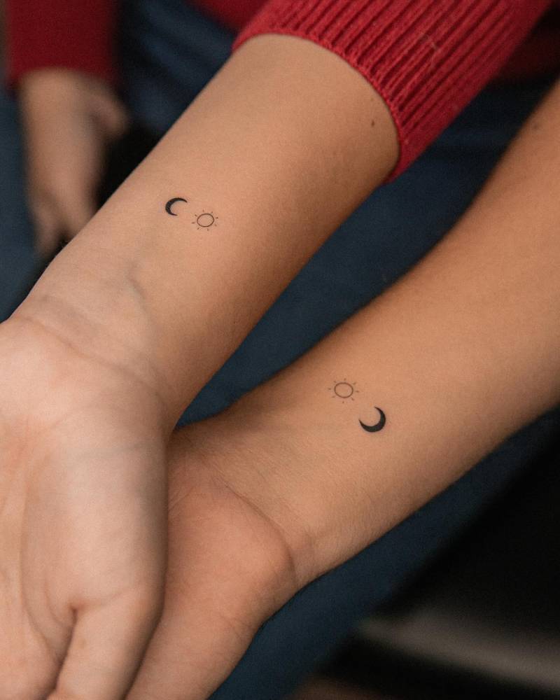 Matching minimalistic sun and moon tattoo for best friends.