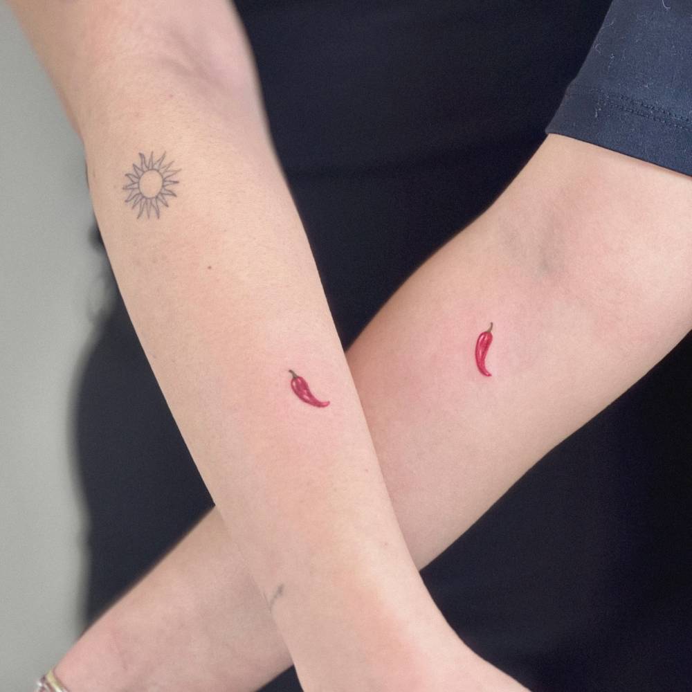 Matching little red chili tattoo for best friends.