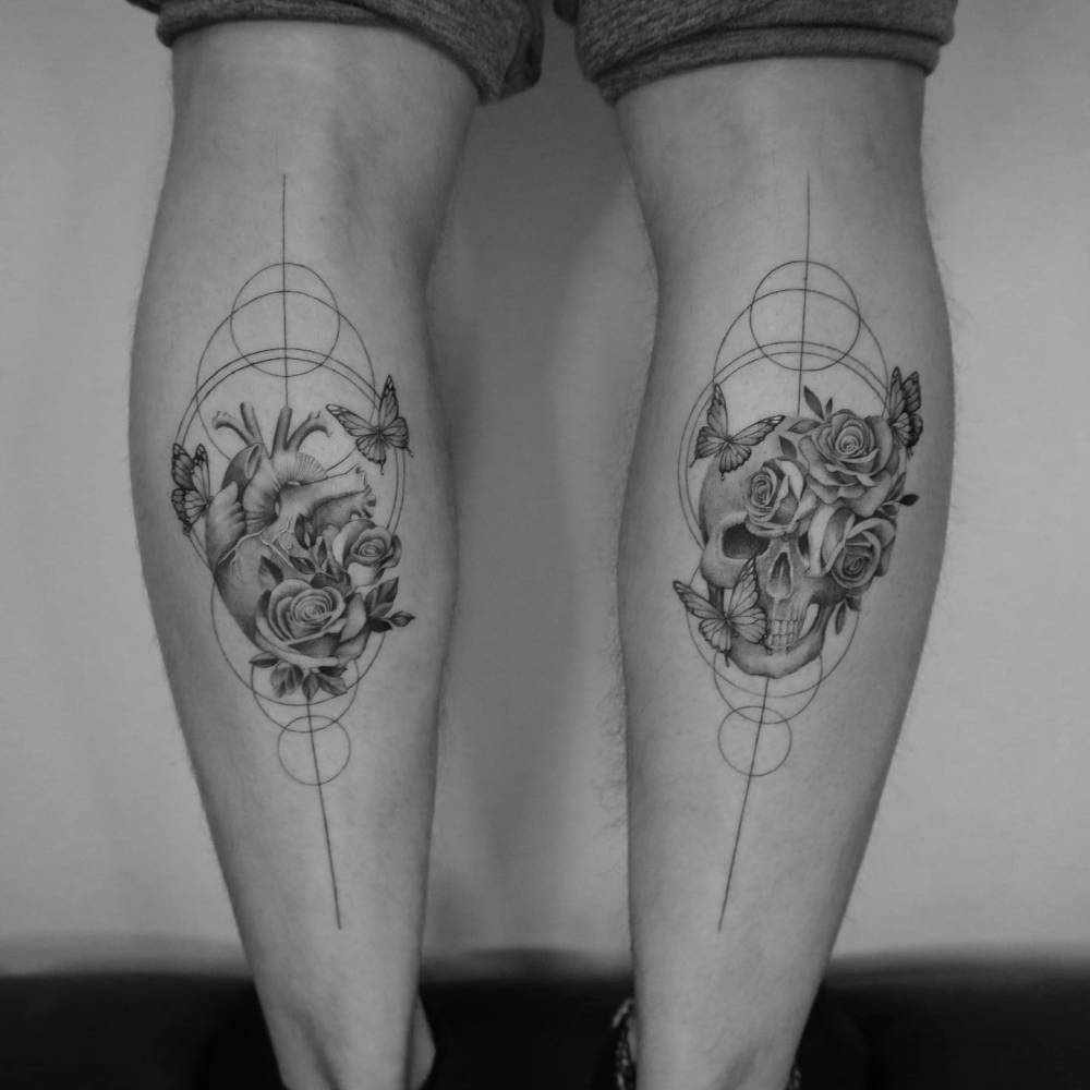 Individual matching anatomical heart and skull tattoos located on the calf.