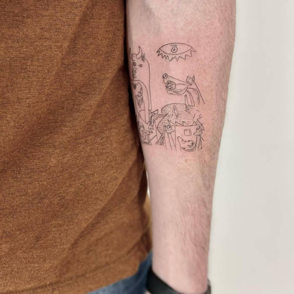 Fine line Guernica tattoo on the inner forearm.