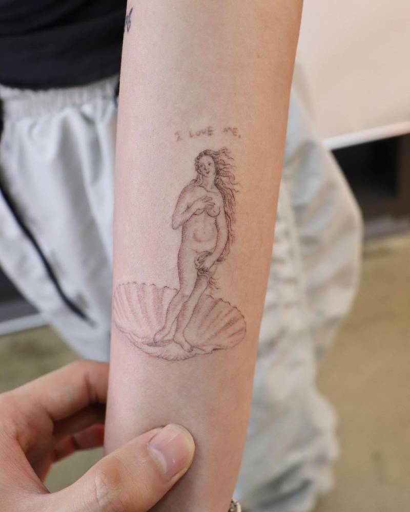 Hand poked 'The Birth of Venus" tattoo located on the inner forearm.