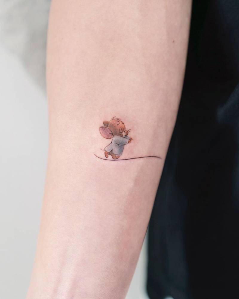 Jerry tattoo located on the inner forearm.