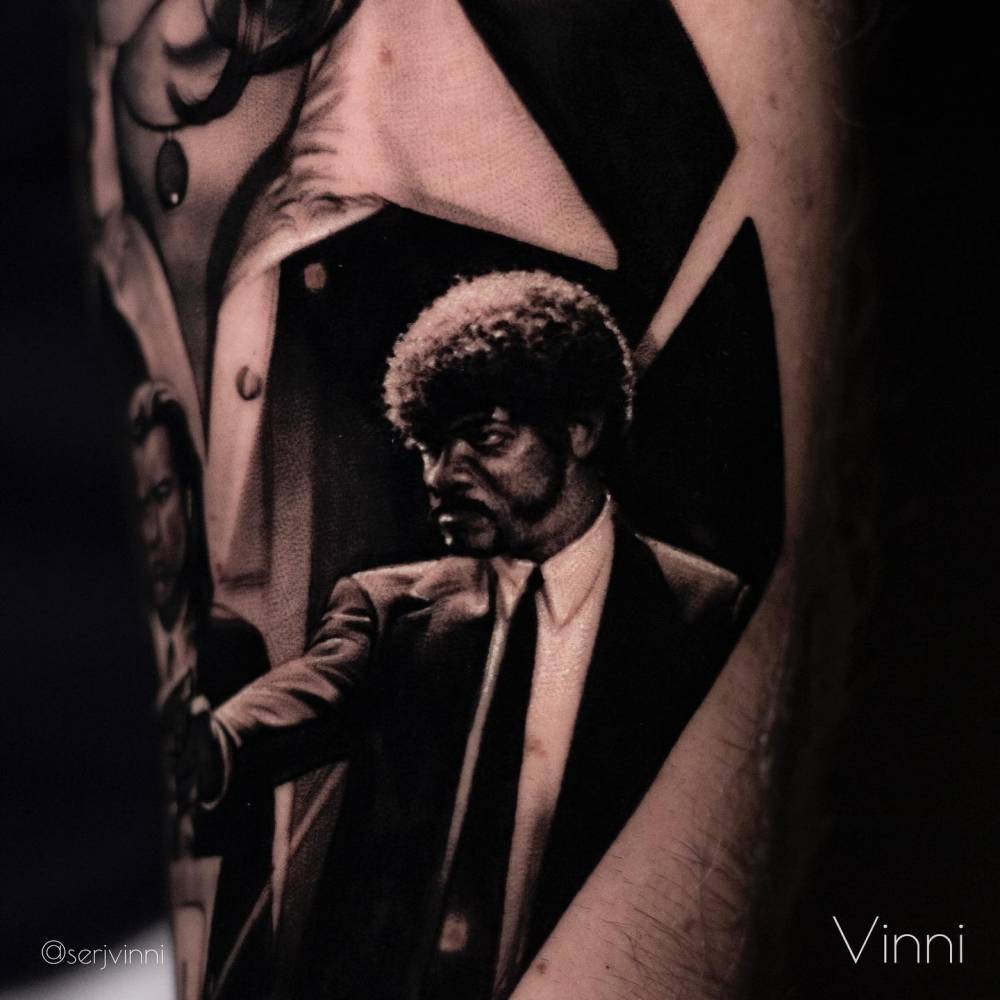 Jules Winfield tattoo located on the inner forearm.