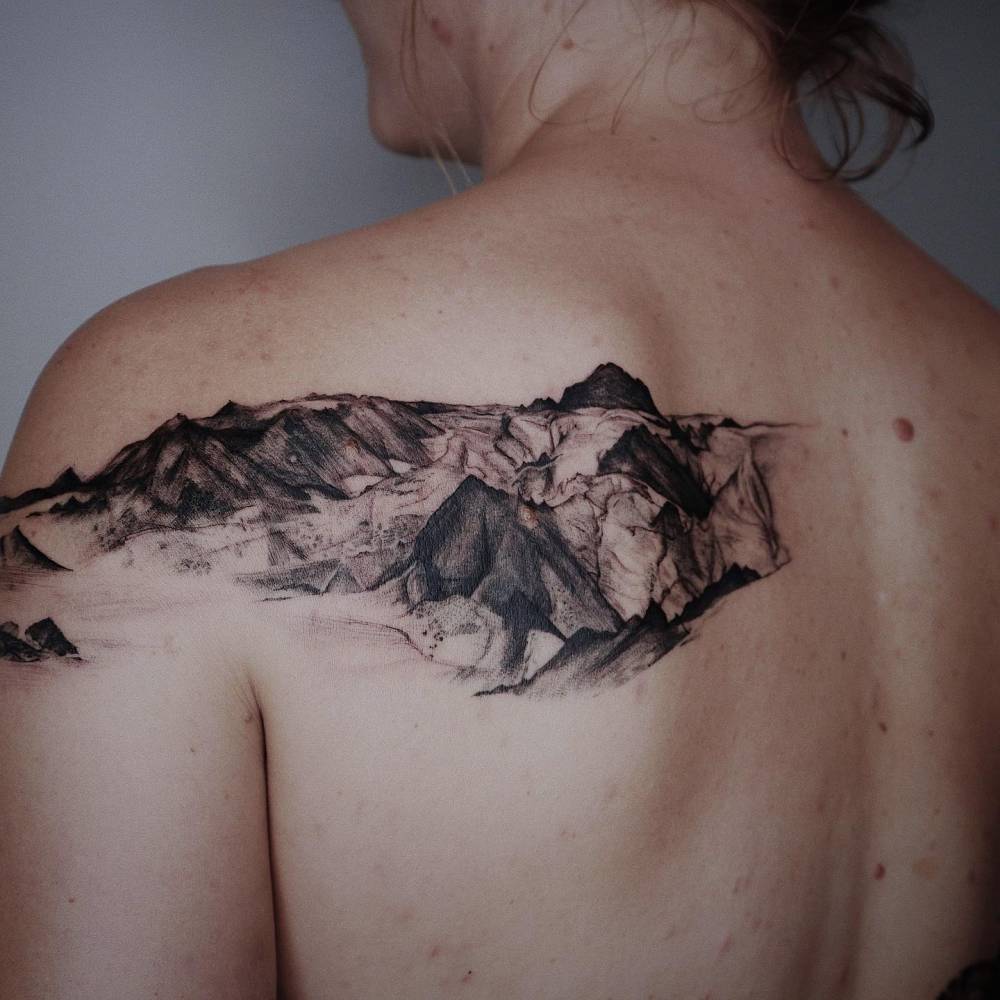 Mýrdalsjökull glacier in Iceland tattooed on the shoulder blade.
