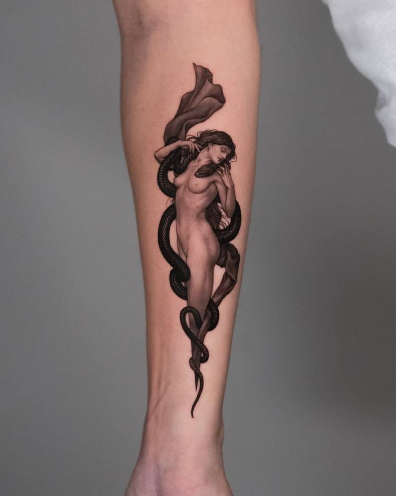 Micro-realistic style Lilith tattoo located on the inner forearm.