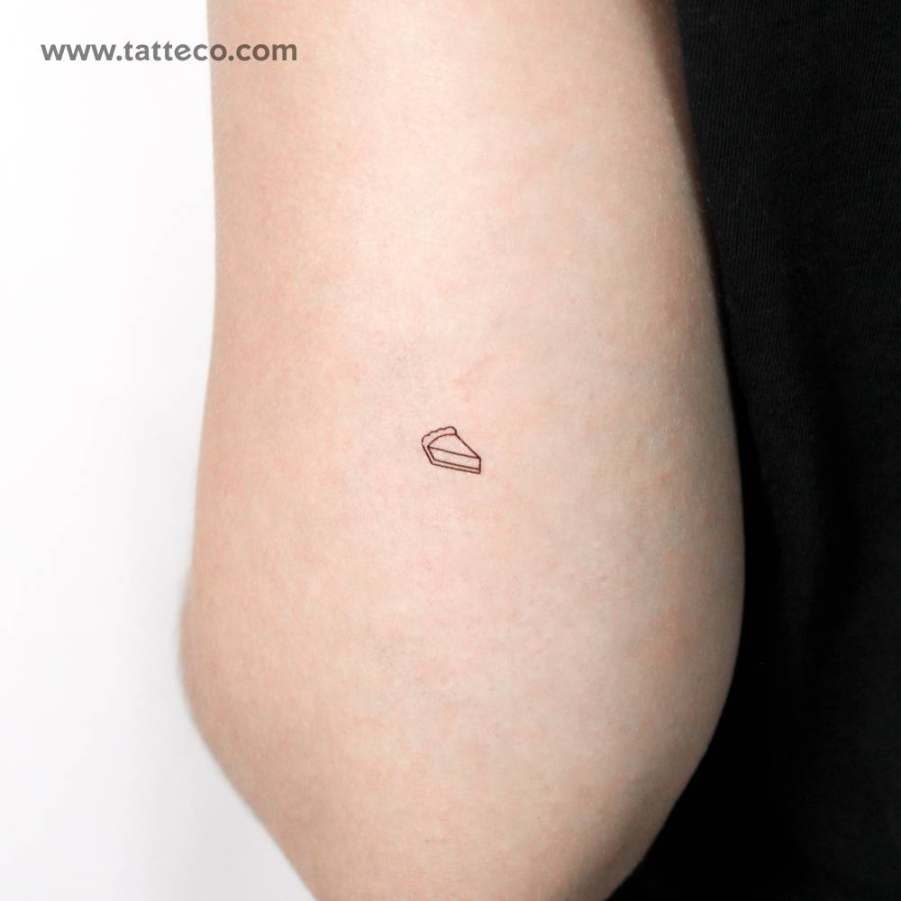 Little minimalistic pie slice temporary tattoo located on the tricep.