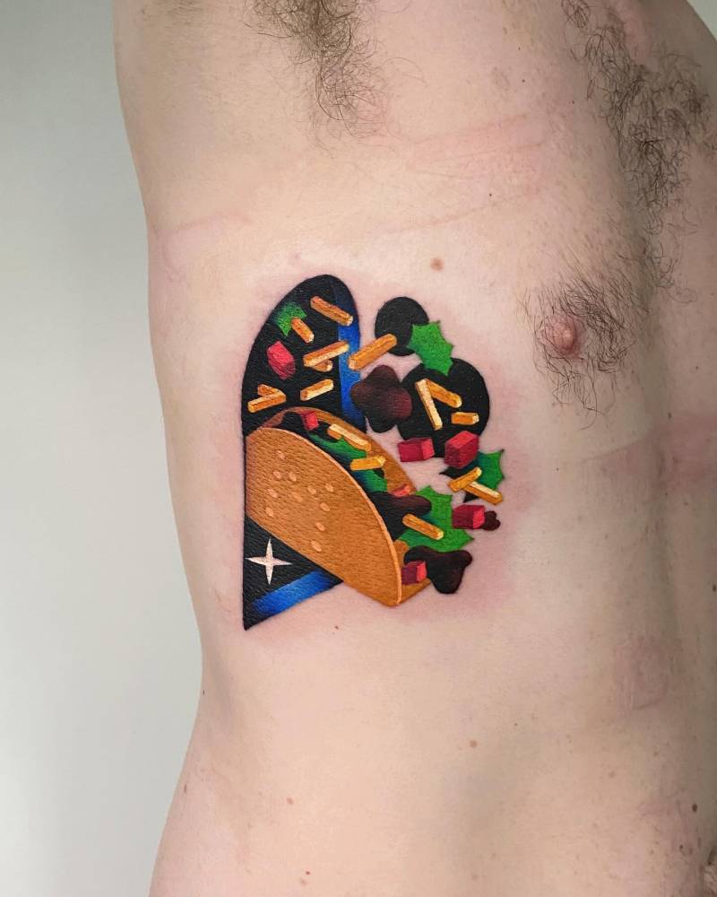 Pop art style taco tattoo located on the rib.