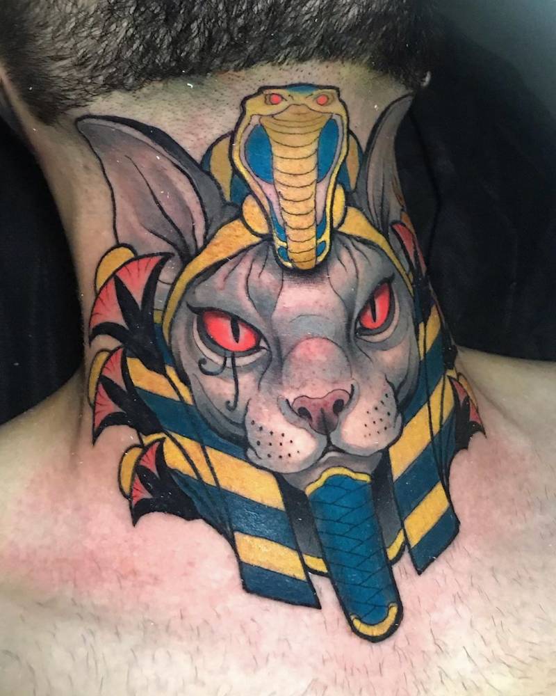 Neotraditional Egyptian sphynx cat tattoo on the neck.