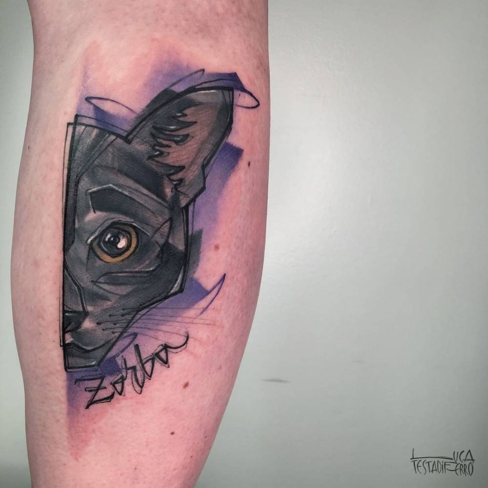 Sketch work black cat portrait tattoo done on the calf.