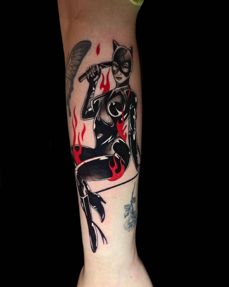 Catwoman tattoo done on the forearm, comic style.