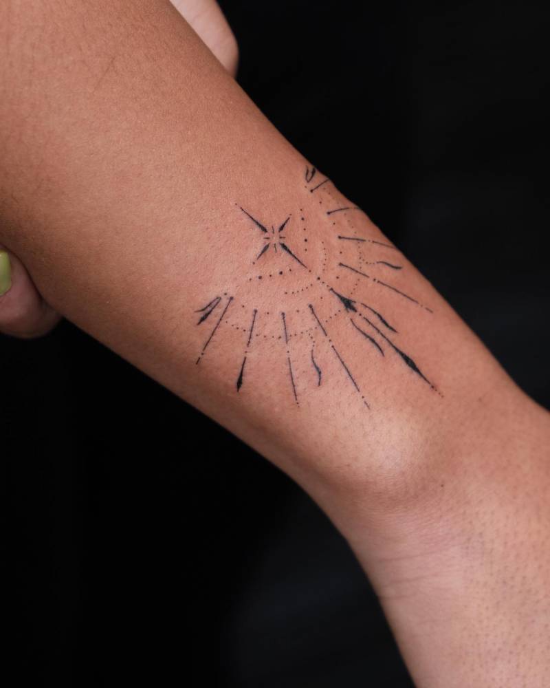 Ornamental tattoo placed on the wrist.