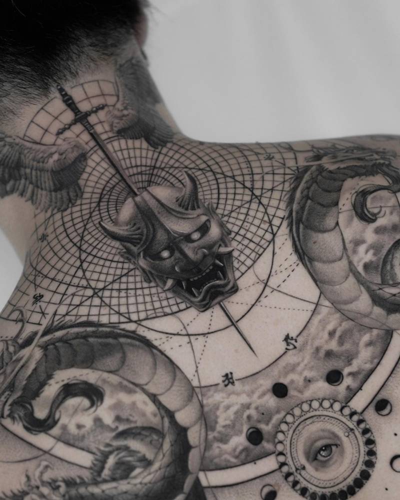 Graphic style back composition tattoos.