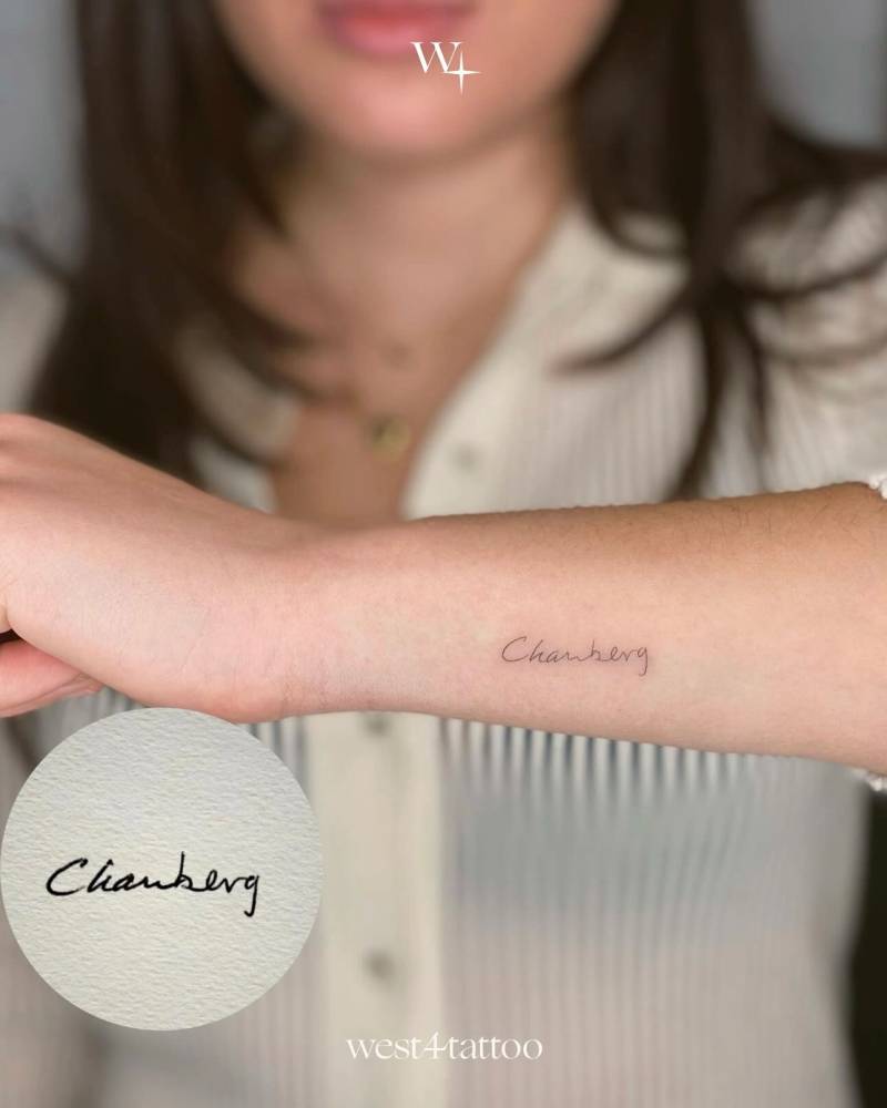Signature tattoo located on the wrist.