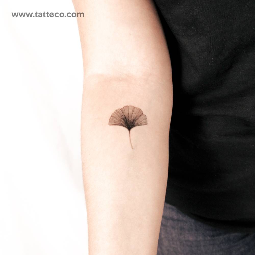 Ginkgo leaf semi-permanent tattoo located on the inner forearm.