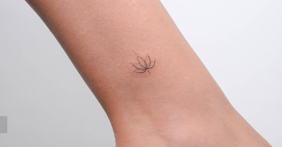 Little lotus flower tattoo located on the ankle, done