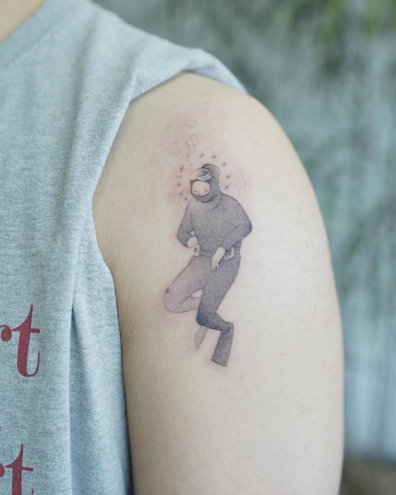 Haenyeo (female korean divers) tattoo located on the upper arm.